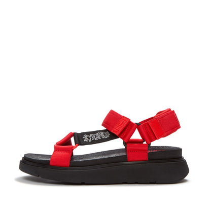 รองเท้าแตะแบบรัดส้น ผู้หญิง รุ่น FITFLOP X KEITH HARING GEN-FF T-BAR SANDALS