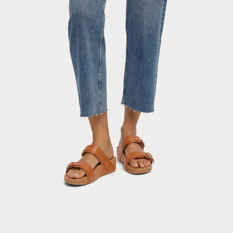 サンダル・ミュール FitFlop Lulu Leather Slides Light Tan ES7-592 LULU CRYSTAL-BUCKLE LEATHER CROSS SLIDES – FitFlop Thailand